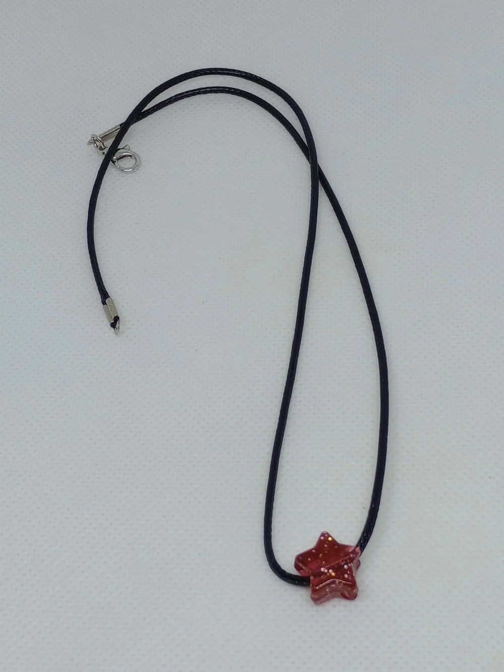 Red STAR Necklace on Black Cord - Unbranded